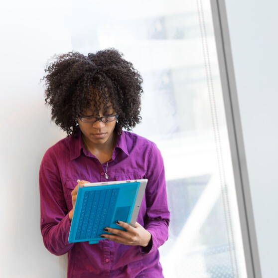 Woman in purple in dress shirt